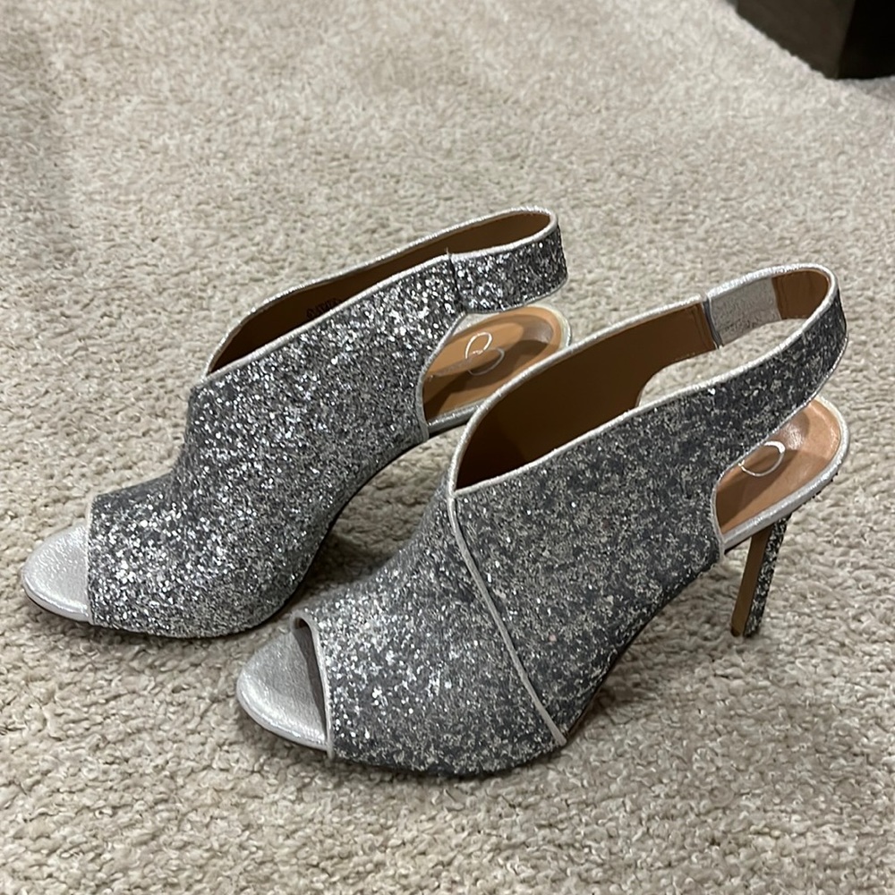 Brand new Jessica Simpson silver sparkle peep toe heels! Size 9.5.